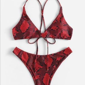 Red snakeskin swimsuit!